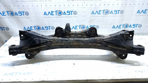 The rear subframe of a Toyota Prius 50 16-22 FWD is rusty and filed.
