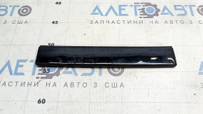 The rear right roof lining for a Polestar 2 21-25 has worn paint.