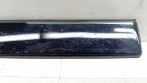 The rear right roof lining for a Polestar 2 21-25 has worn paint.