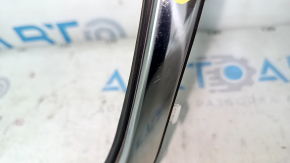 Upper rear left door molding for a Lexus CT200h, 11-17 scratches