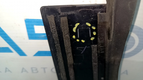 The rear left side door trim for a Lexus CT200h 11-17 has a broken mount.