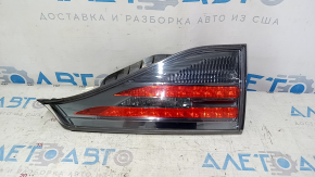 Right inner trunk lid light for Lexus CT200h 11-17 scratches