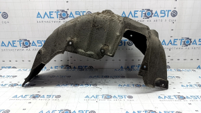 The rear right fender liner of a Lexus CT200h 11-17 has torn fasteners.
