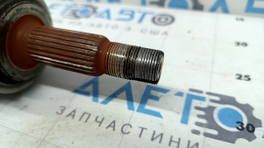 The front right half shaft of a Lexus CT200h 11-17 has stripped threads.