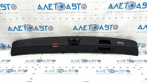 Lower trim of the trunk door of Mercedes W167 GLE 350 450 20-24 black, lower part, with a plug and a lamp, scratches, whitened plastic