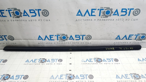 Door-glass molding, central front left, Tesla Model Y 20-25 matte, scratched