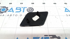 The right front bumper headlight washer cap for a Volvo XC90 16-23 has a broken mount.
