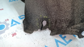 The rear left fender liner of a Lexus CT200h 11-17 has torn fasteners.