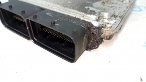 The ECU (engine computer) for the VW Tiguan 18-24 engine has a melted connector.