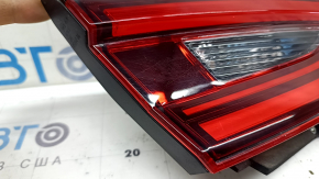 Honda Insight 19-22 left trunk lid inner light scratches