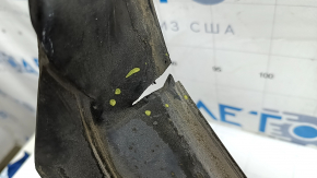 The plastic windshield wiper grille on a 19-22 Honda Insight is torn.