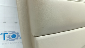 Beige front left door panel for Jeep Grand Cherokee WK2 19-22, with beige and black leather inserts, beige leather armrest, dark wood molding, with handle, scratches, dents, needs cleaning