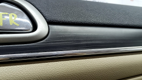 Beige front right door panel for Jeep Grand Cherokee WK2 19-22, with beige and black leather inserts, beige leather armrest, dark wood molding, with handle, scratches, dents, needs cleaning