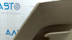 Left arch trim for a Jeep Grand Cherokee WK2 18-20, beige, electric, with hooks, scratches, crack, needs cleaning