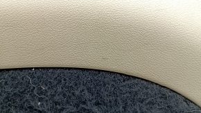 Left arch trim for a Jeep Grand Cherokee WK2 18-20, beige, electric, with hooks, scratches, crack, needs cleaning