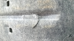 The left underbody protection of a Honda Insight 19-22 is worn and torn.