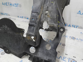 The engine guard of the Honda Insight 19-22 is torn, cracked, dented, missing fragments