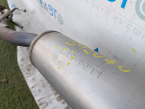 The rear exhaust pipe with the barrel of a 19-22 Honda Insight is dented.