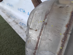 The rear exhaust pipe with the barrel of a 19-22 Honda Insight is dented.