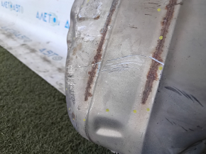 The rear exhaust pipe with the barrel of a 19-22 Honda Insight is dented.