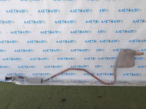 The rear exhaust pipe with the barrel of a 19-22 Honda Insight is dented.