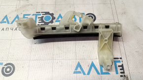 The rear right door glass guide on a 13-16 Dodge Dart has a broken mount.