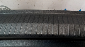 VW Tiguan 18-24 trunk opening trim, black, scratches, broken mount