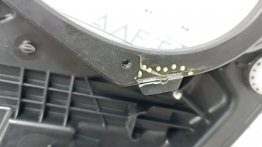 The rear left window lift mechanism of a Jeep Renegade 15-23 has a broken mount.