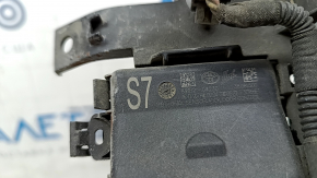 The Toyota Venza 21-24 foot trunk opening sensor with bracket is broken.