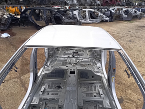Metal roof of a Chevrolet Volt 16-on-body, dented