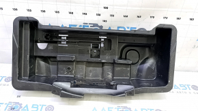 The Audi A4 B9 17 trunk tool tray has a broken mount and scratches.