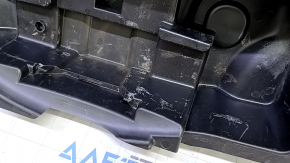 The Audi A4 B9 17 trunk tool tray has a broken mount and scratches.
