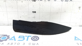 The right front bumper mudguard of an Audi A4 B9 17-25 is worn and scratched.