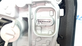 Right headlight for a 1995 Jeep Renegade (pre-restored) with graphite frame and scratches.