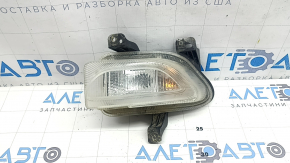 Front left turn signal with DRL for a 2015-2018 Jeep Renegade, fogged up, cracks in the mounts, crack