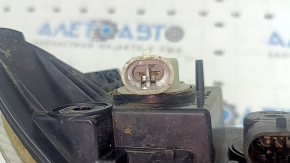 Front left turn signal with DRL for a 2015-2018 Jeep Renegade, fogged up, cracks in the mounts, crack