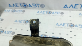 Front left turn signal with DRL for a 2015-2018 Jeep Renegade, fogged up, cracks in the mounts, crack