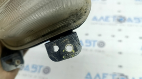 Front left turn signal with DRL for a 2015-2018 Jeep Renegade, fogged up, cracks in the mounts, crack