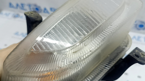 Front left turn signal with DRL for a 2015-2018 Jeep Renegade, fogged up, cracks in the mounts, crack