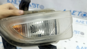 Front left turn signal with DRL for a 2015-2018 Jeep Renegade, fogged up, cracks in the mounts, crack