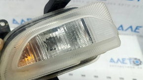 Front right turn signal with DRL for a 2015-2018 Jeep Renegade, fogged up, cracks in the mounts, cracks