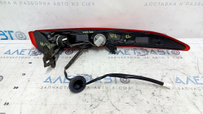 The outer left fender light of a Toyota Venza 21-24 is worn out.