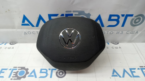 The steering wheel airbag for the driver's side of a Volkswagen ID.4 21-22 is black, without wiring, and has scratches.