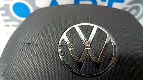The steering wheel airbag for the driver's side of a Volkswagen ID.4 21-22 is black, without wiring, and has scratches.