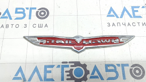 The Trail Hawk emblem on the Jeep Renegade 15-23 tailgate has peeled off.