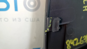 The lower left center pillar trim for a 2021 Toyota Venza is black, the plastic has turned white.