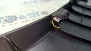 The lower left center pillar trim for a 2021 Toyota Venza is black, the plastic has turned white.