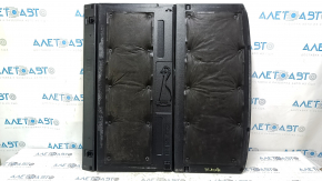 The trunk floor of a 2018 Toyota Venza, black Limited, XLE, needs dry cleaning. The handle is defective, it is worn, dented, and torn.