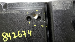 The trunk floor of a 2018 Toyota Venza, black Limited, XLE, needs dry cleaning. The handle is defective, it is worn, dented, and torn.