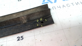 The lower rear right door seal of a Toyota Venza 21-24 is torn.